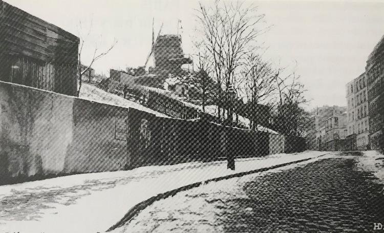 The Montmartre street depicted in the painting, in a period photograph.