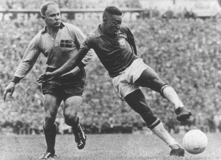 Pel&eacute; in action for Brazil at the 1958 World Cup in Sweden