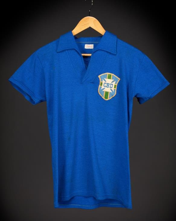 The handmade blue shirt bearing the improvised CBD badge, commissioned after a colour clash with Sweden