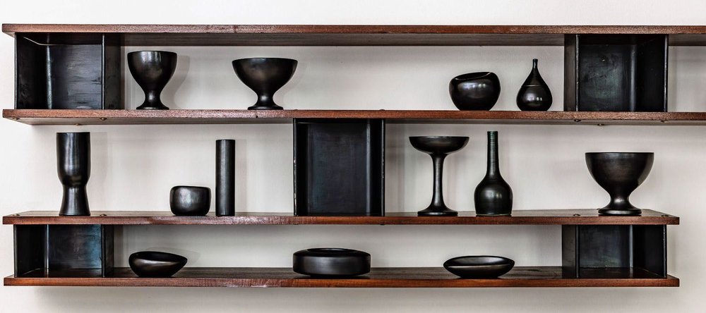 A group of black glazed ceramics by Georges Jouve from the Emmanuel de Bayser Collection.